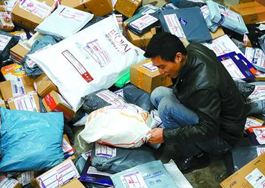 中外企业参与回收快递包装纸箱 3年少用纸1250吨